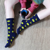 BARX SOX Navy Blue Dachshund Socks while holding Coffee
